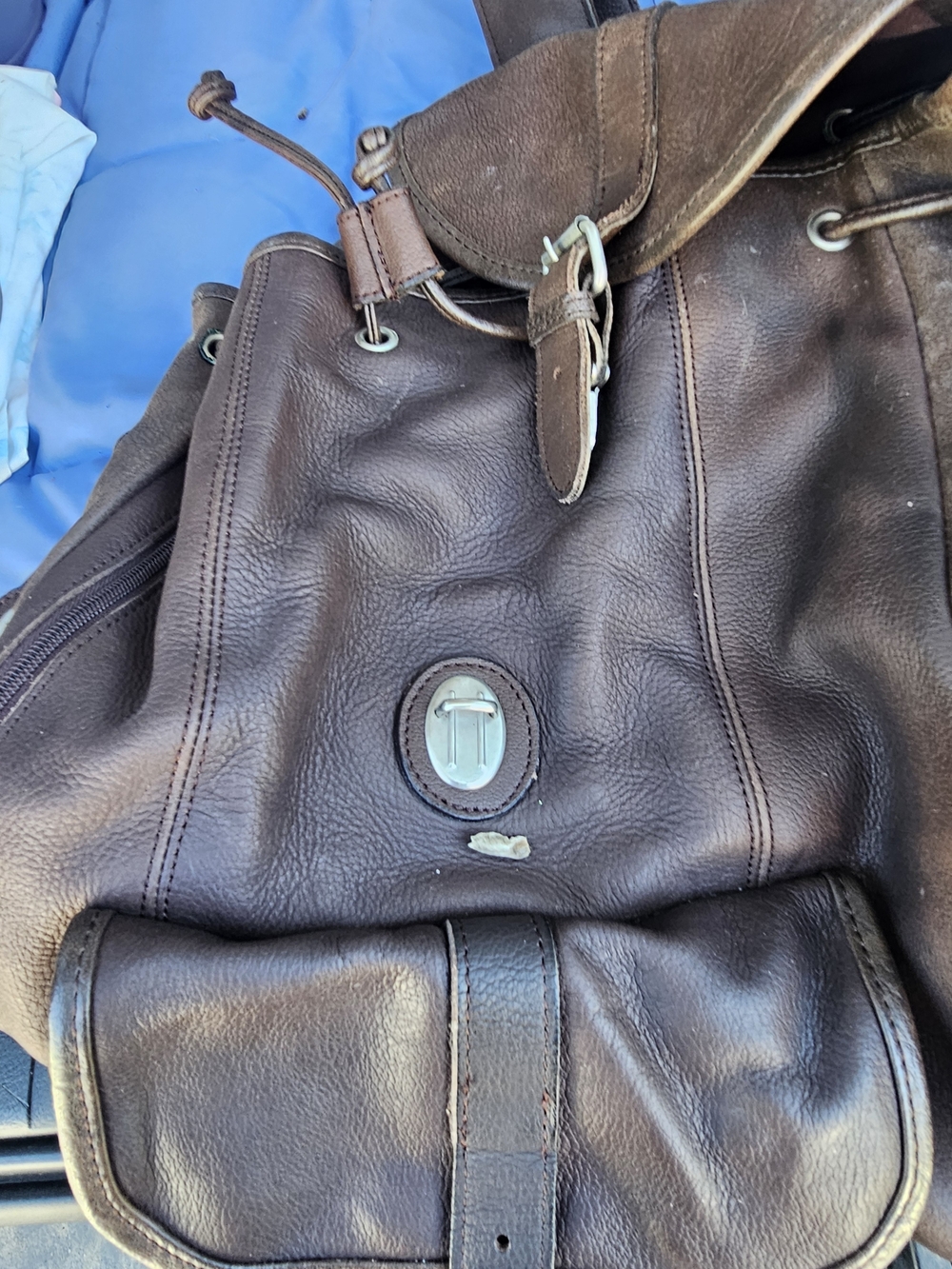Brown Leather Drawstring Backpack with Buckle Accent